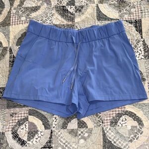 Lululemon Women's On The Fly Drawstring Shorts - size 10 - 2.5” - periwinkle